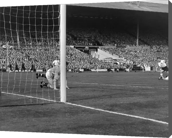 Johnny Hayes scores Englands sixth goal against Scotland in the 1961 Home Nations Championship