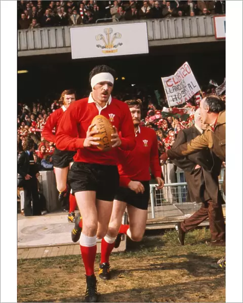 Mervyn Davies leads out the Welsh team at Cardiff Arms Park - 1975 Five Nations