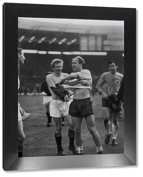 Denis Law and Bobby Charlton swap shirts at Wembley in 1965
