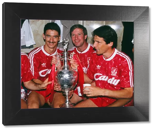 Liverpools Ian Rush, Ronnie Whelan and Alan Hansen celebrate winning the league in 1990