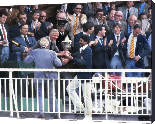 Kapil Dev is presented with the cricket World Cup in 1983