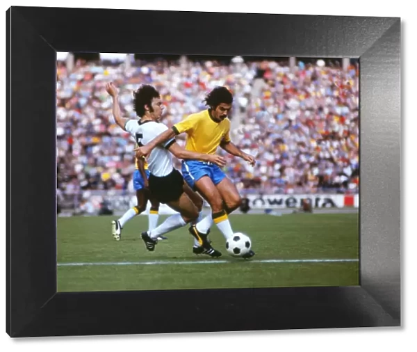 Franz Beckenbauer tackles Rivelino in 1973