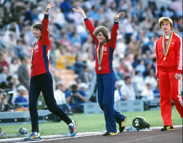 Michelle Probert (left) and Linsey MacDonald celebrate with their bronze medals -1980 Moscow Olympics