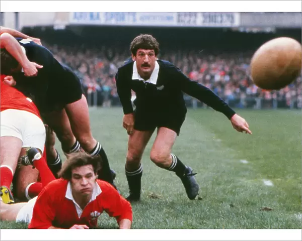 Wales Terry Holmes gets the ball away against the All Blacks in 1980 under pressure from Graham Mourie