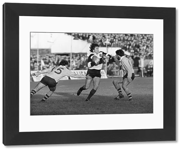Andy Irvine evades Australian defenders for the Barbarians in 1976