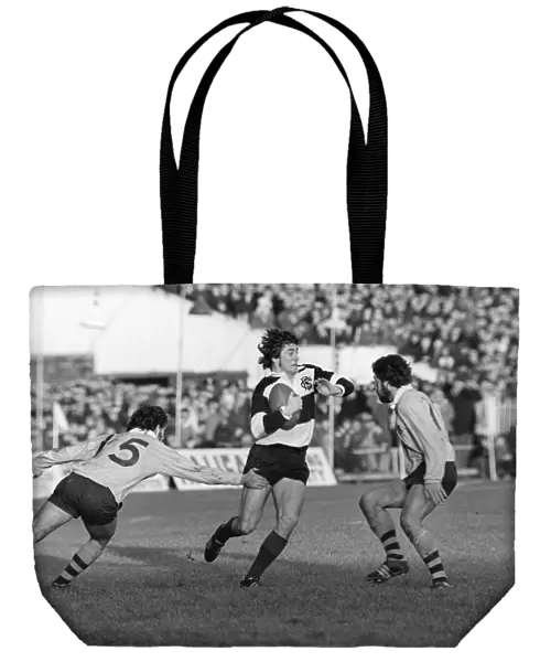 Andy Irvine evades Australian defenders for the Barbarians in 1976