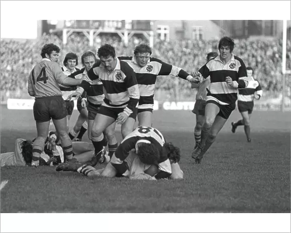 Mervyn Davies tackles an Australian player for the Barbarians in 1976 with his teammates moving in in support