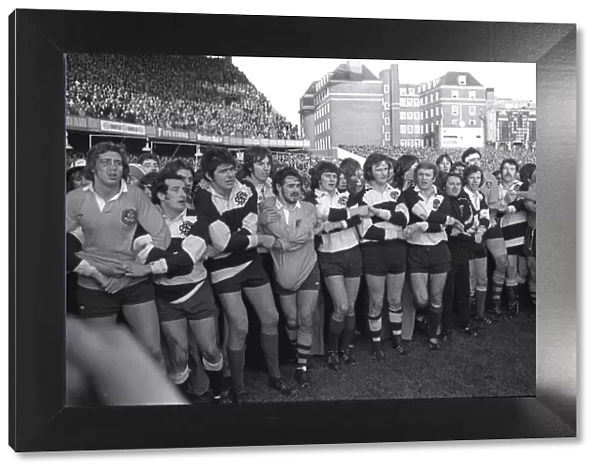 The two sides link hands at the end of the match after the Barbarians defeat the Australians in 1976