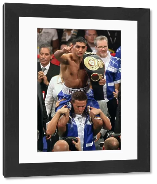 Amir Khan celebrates after his 2011 victory over Paul McCloskey