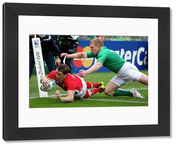 Shane Williams evades Keith Earls to score in the 2011 World Cup quarter-final