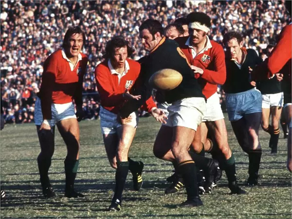 JJ Williams passes the ball for the Lions during the Third Test against South Africa in 1974