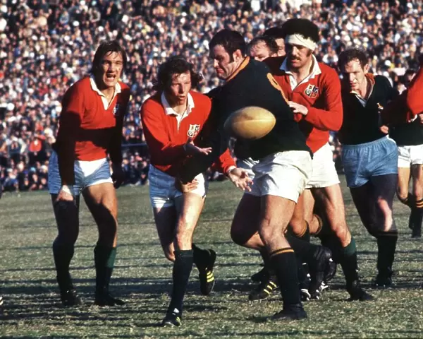JJ Williams passes the ball for the Lions during the Third Test against South Africa in 1974