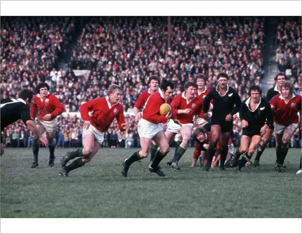 Phil Bennett runs with the ball during the 4th Test of the 1977 Lions Tour to New Zealand
