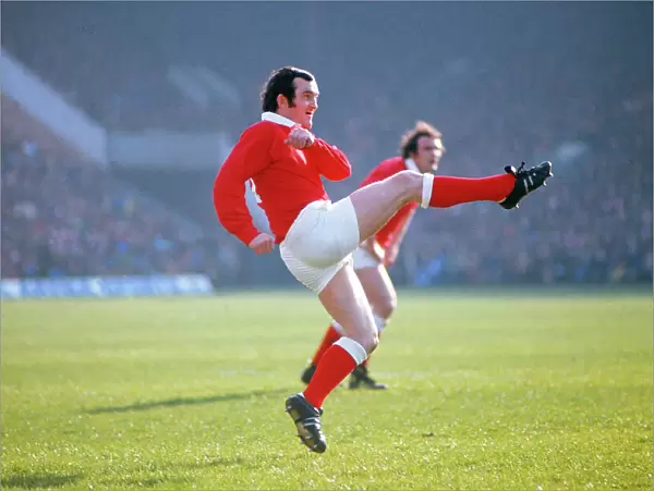 Phil Bennett kicks to touch during the 1977 Five Nations