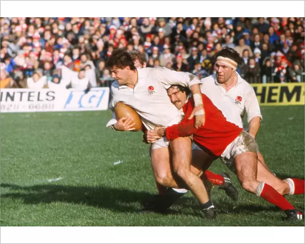 Nick Jeavons is tackled by Jeff Squire during the 1983 Five Nations