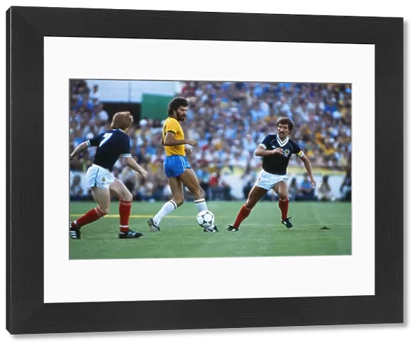 Brazils Socrates takes on Scotland at the 1982 World Cup