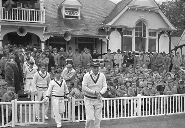 Don Bradman leads his Australia team out for the first game of their 1948 tour of England
