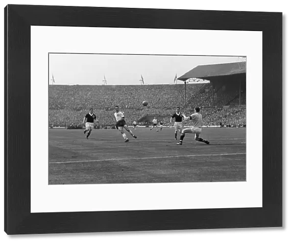 Jimmy Greaves scores against Scotland at Wembley in 1961