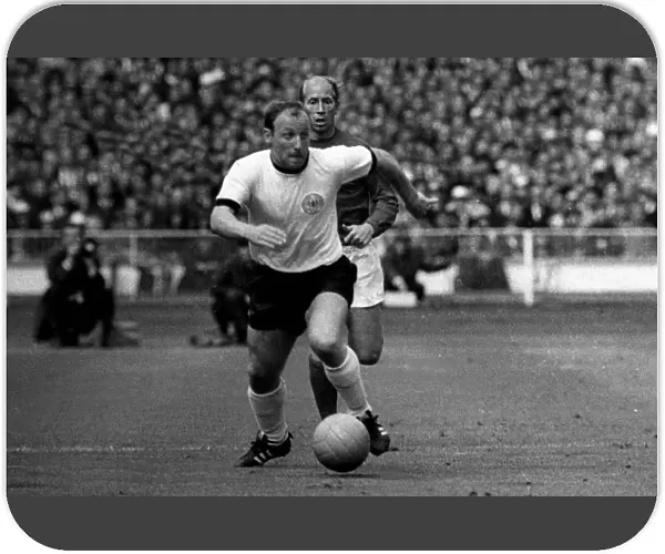 Uwe Seeler of West Germany on the ball during the 1966 World Cup final +
