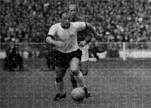 Uwe Seeler of West Germany on the ball during the 1966 World Cup final +