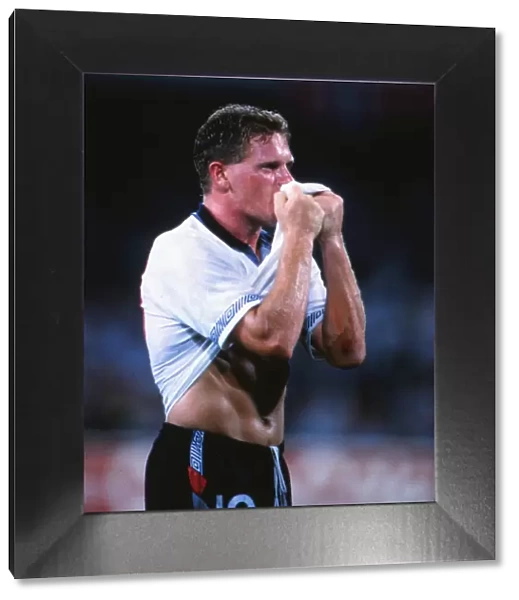 Paul Gascoigne kisses his shirt in celebration after victory over Cameroon at Italia 90