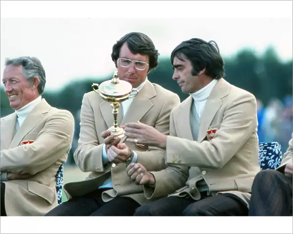 Hale Irwin and Dave Hill of the USA inspect the Ryder Cup in 1977