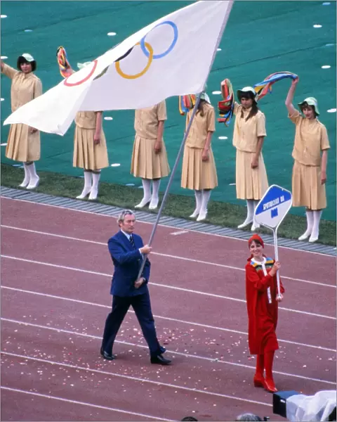 BOA official Dick Palmer carries the Olympic flag for Great Britain during the Opening Ceremony of the 1980 Moscow Olympics