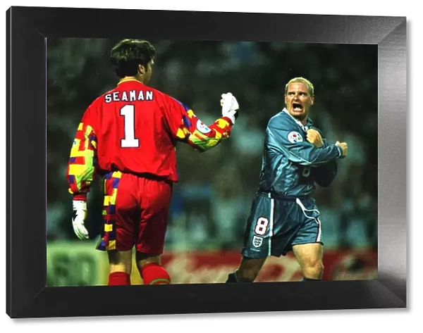 Paul Gascoigne and David Seaman celebrate during the penalty shoot-out against Germany at Euro 96