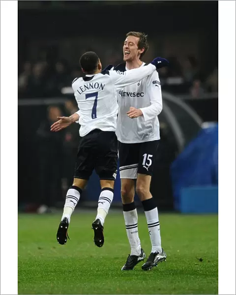 Aaron Lennon congratulates Peter Crouch on his late goal against AC Milan in the 2010  /  11 Champions League