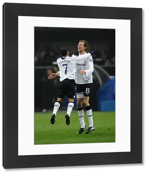 Aaron Lennon congratulates Peter Crouch on his late goal against AC Milan in the 2010  /  11 Champions League