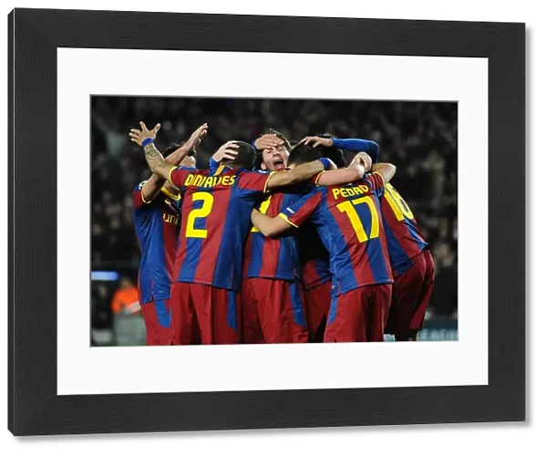 Lionel Messi celebrates with his Barcelona teammates after scoring his brilliant goal against Arsenal in the 2011 Champions League