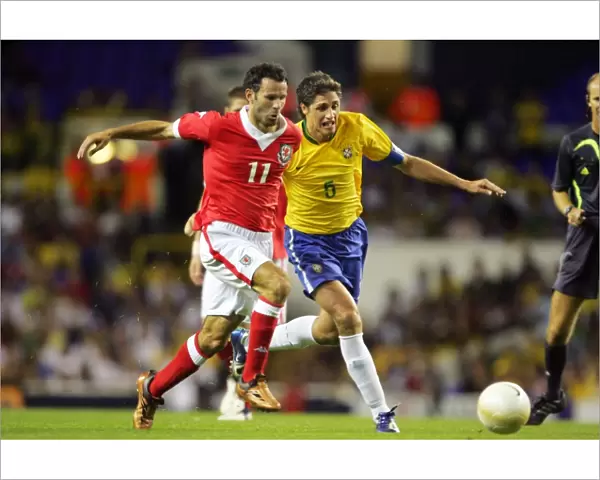 Ryan Giggs takes on Brazil