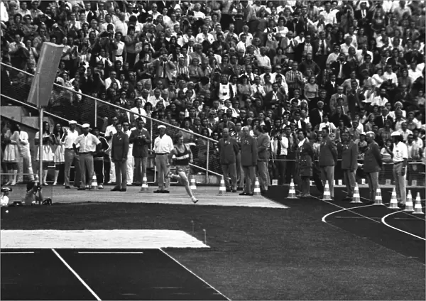 West German student Norbert Sudhaus runs into the stadium as a prank at the end of the marathon at the 1972 Munich Olympics