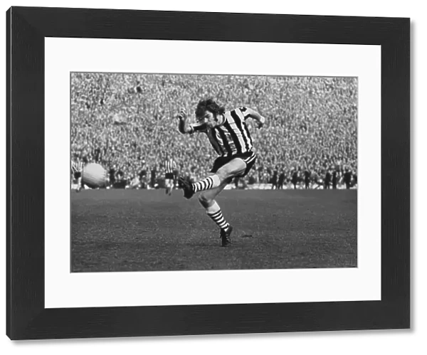 Newcastle Uniteds Malcolm MacDonald shoots during the 1974 FA Cup semi-final