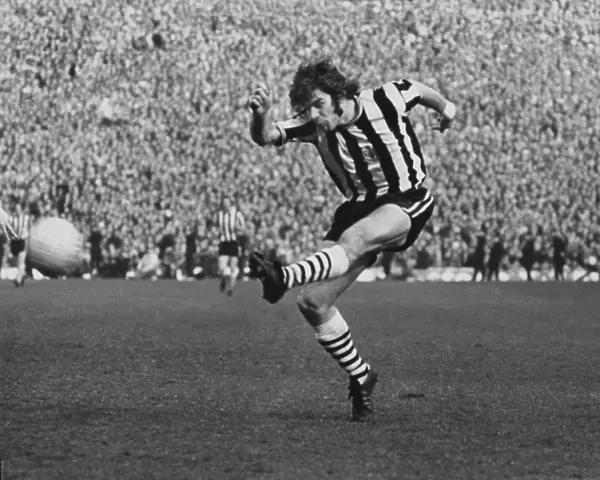 Newcastle Uniteds Malcolm MacDonald shoots during the 1974 FA Cup semi-final