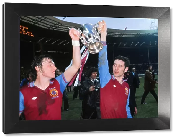 Bobby McDonald and John Robson celebrate winning the 1975 League Cup Final