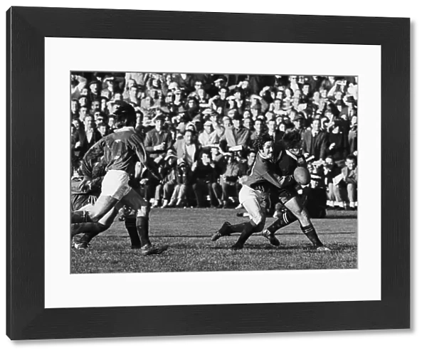 British Lions winger Gerald Davies tackles All Blacks winger Bryan Williams without the ball, resulting in referee John Pring awarded the All Blacks a penalty try during the 2nd Test of the 1971 Tour