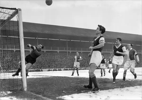 Blackburn and West Ham play in a snowy Ewood Park during the 1956 FA Cup