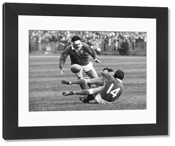 Mervyn Davies swoops in to collect the loose ball during the 1976 Five Nations