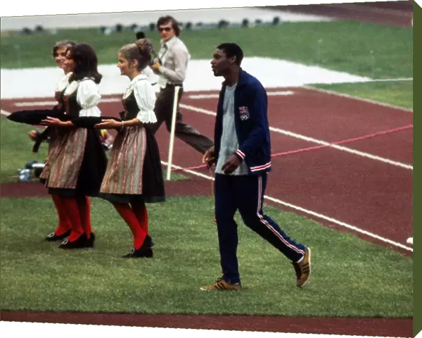 Vince Matthews casually swings his 400m Olympic gold medal after the ceremony in 1972