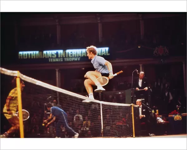 Mark Cox vaults the net after winning the 1975 Rothmans International Tennis Trophy