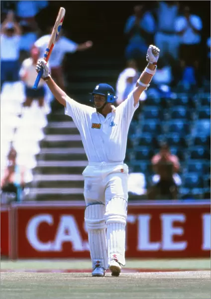Mike Atherton celebrates reaching his century on the way to scoring 185 not out against South Africa in 1995
