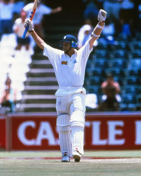 Mike Atherton celebrates reaching his century on the way to scoring 185 not out against South Africa in 1995