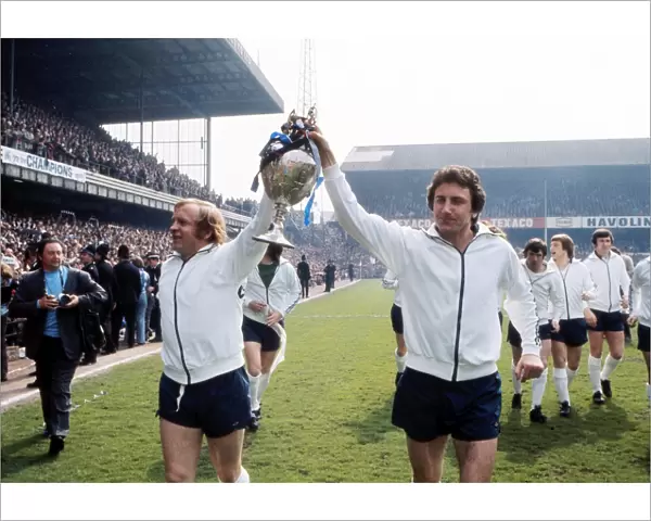 Derby Countys Roy McFarland and Francis Lee parade the League trophy in 1975