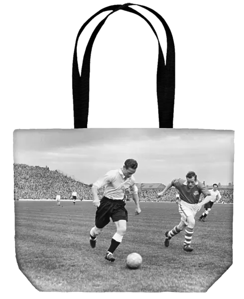 Tom Finney on the ball for the English League at Blackpool in 1950