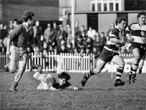 Huw Davies makes a break for the Barbarians during the 1982 Mobbs Memorial Match