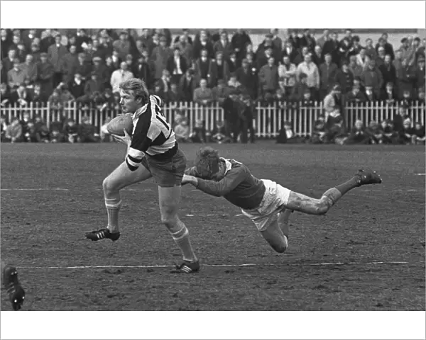 John Spencer makes a break for the Barbarians in the 1969 Mobbs Memorial Match