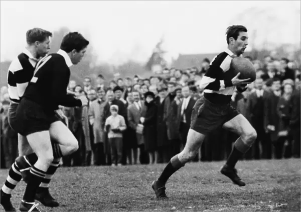 David Hearn runs with the ball for the Barbarians in 1967