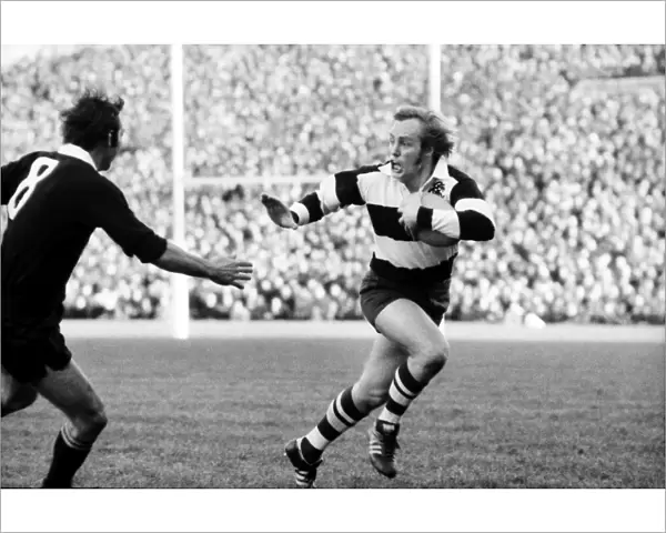 David Duckham makes a break for the Barbarians in 1974