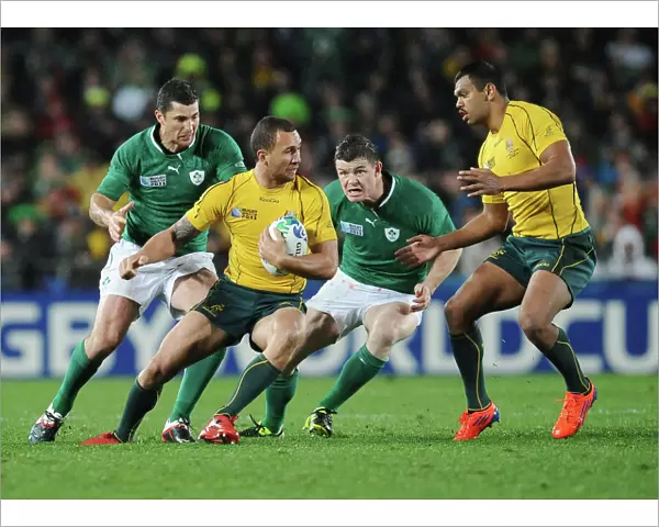 Brian O Driscoll bears down on Quade Cooper during the 2011 World Cup